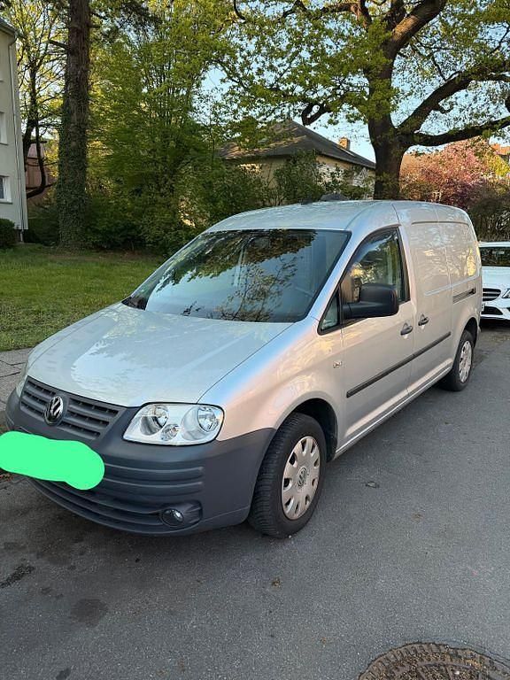 Second-hand VW Caddy 109 CP (80 kW) 2009 Argintiu Monovolum