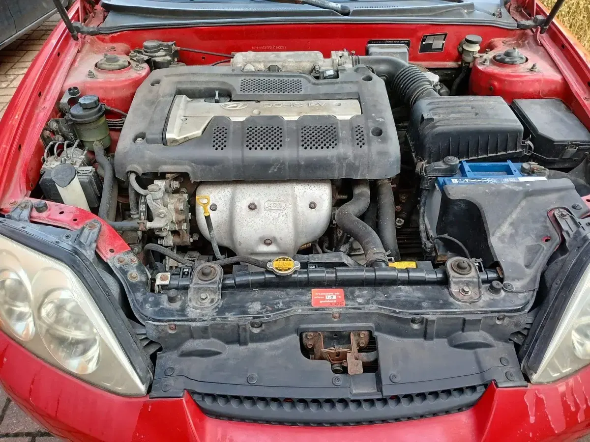 Gebraucht Hyundai Coupé 135 PS (99 kW) 2002 Rot Coupé