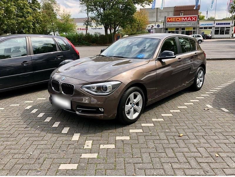 Gebraucht BMW 118 Advantage 170 PS (125 kW) 2015 Braun Kleinwagen