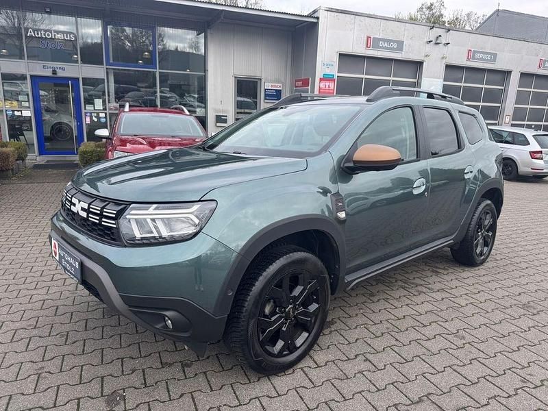 Gruen Gebraucht 2023 Dacia Duster Extreme SUV | 22.998 € (Fairer Preis) - Bild 1/4