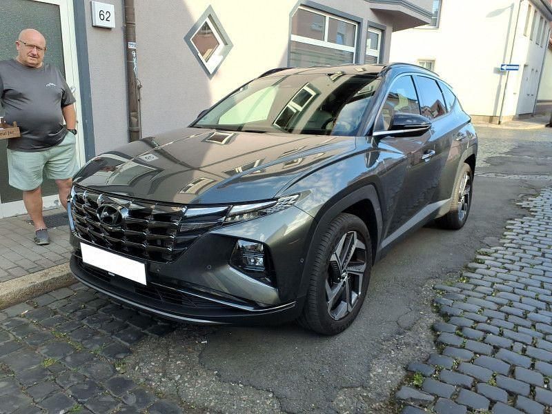 Grau Gebraucht 2021 Hyundai Tucson Prime SUV | 26.780 € (Etwas zu teuer) - Bild 1/4