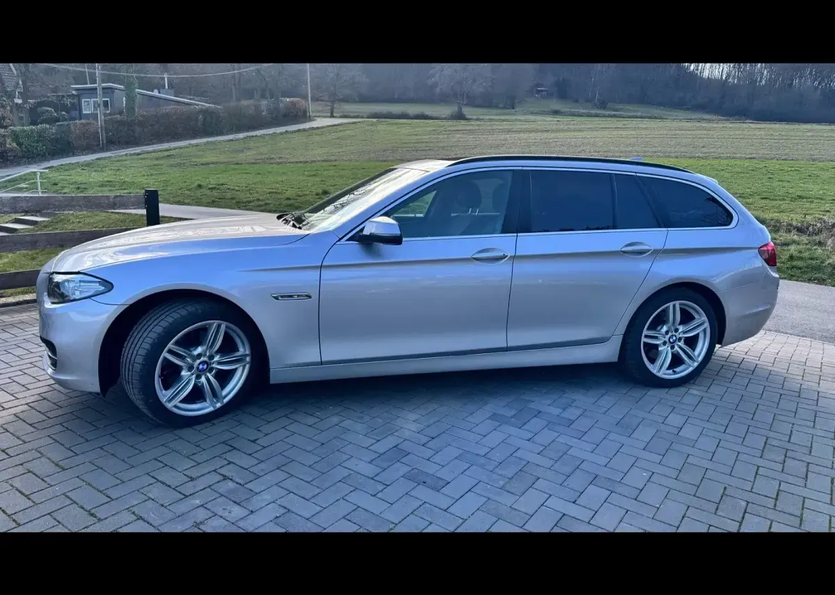 Second-hand BMW 520 Performance 184 CP (135 kW) 2013 Argintiu Break