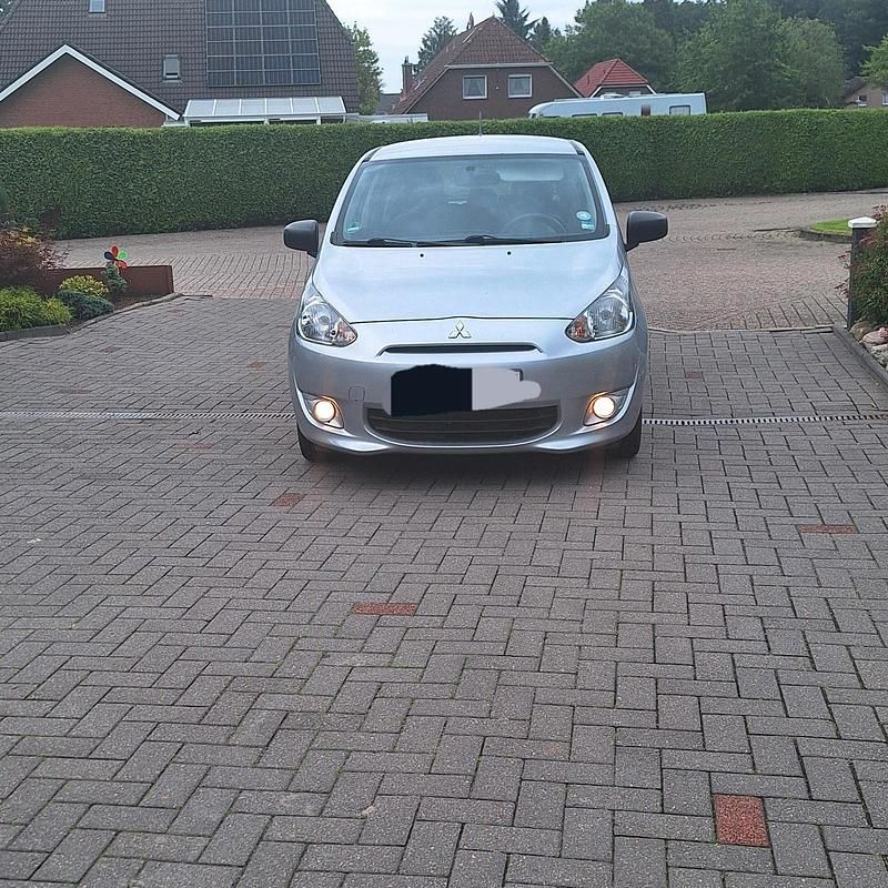 Second-hand Mitsubishi Space Star 71 CP (52 kW) 2015 Argintiu Hatchback