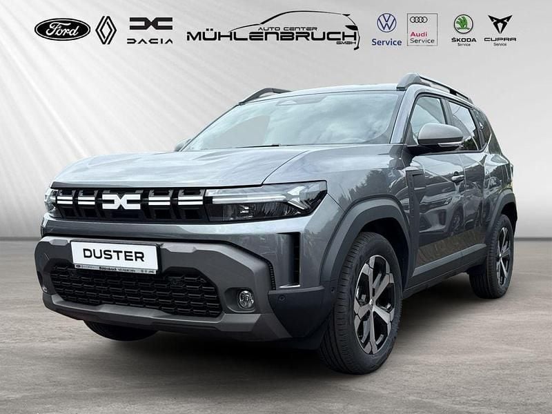 Dolomitgrau metallic Neu 2025 Dacia Duster Journey SUV | 30.520 € (Fairer Preis) - Bild 1/3