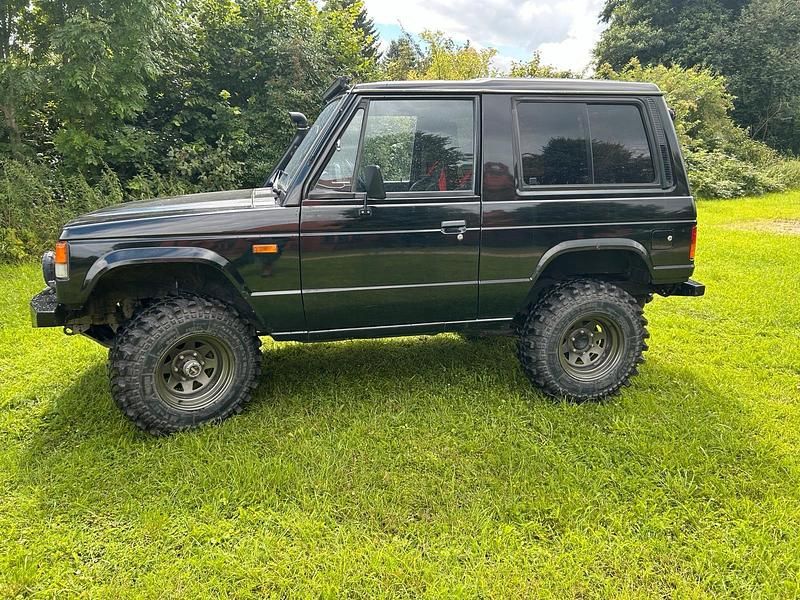 Schwarz Gebraucht 1991 Mitsubishi Pajero SUV | 6.500 € - Bild 1/4