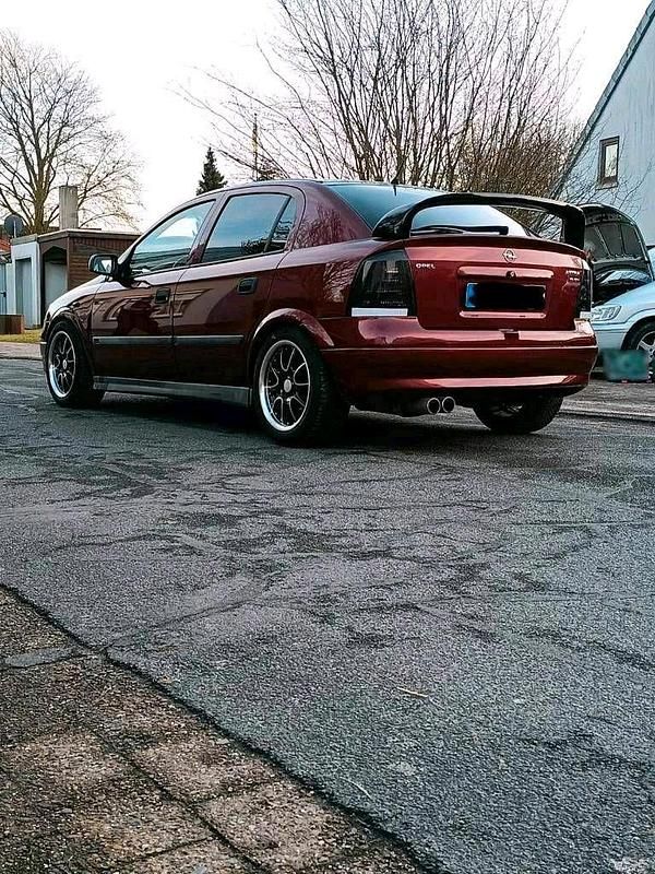 Second-hand Opel Astra 101 CP (74 kW) 2000 Roșu Hatchback