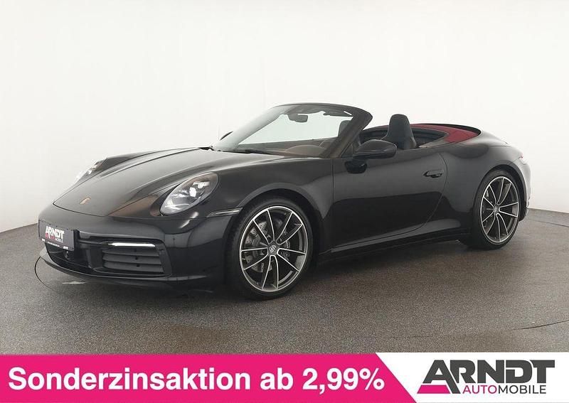 Schwarz Gebraucht 2024 Porsche 911 Carrera Cabriolet Chrono Cabrio | 130.284 € (Fairer Preis) - Bild 1/4