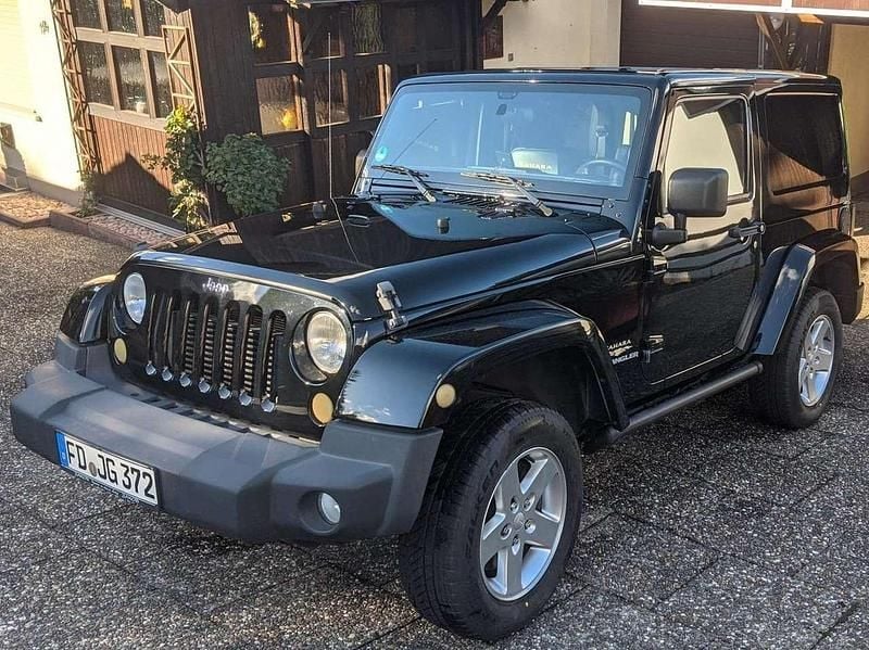Schwarz Gebraucht 2013 Jeep Wrangler Sahara SUV | 33.000 € (Fairer Preis) - Bild 1/4