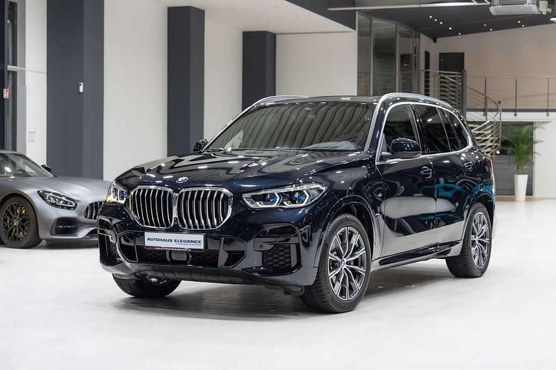 Carbonschwarz metallic Gebraucht 2023 BMW X5 M Sport SUV | 60.980 € (Superpreis) - Bild 1/4
