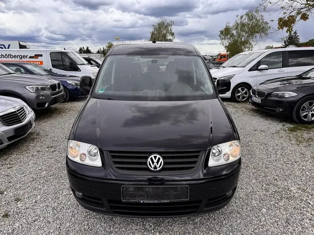 Second-hand VW Caddy Team 80 CP (58 kW) 2010 Negru Monovolum