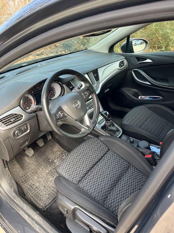 Używany Opel Astra Edition 125 KM (91 kW) 2016 Brązowy Sedan/Limuzyna