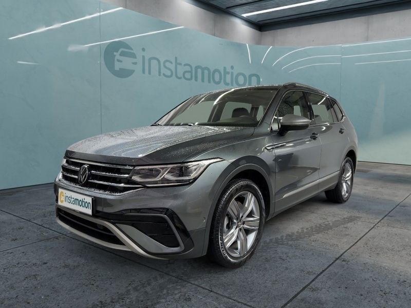 Grau Gebraucht 2023 VW Tiguan Allspace Pro SUV | 43.907 € (Etwas zu teuer) - Bild 1/4