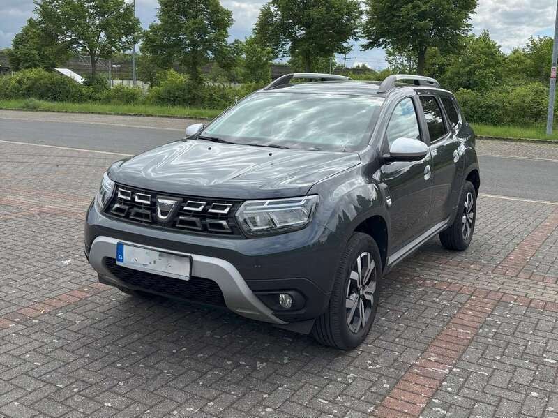 Grau Gebraucht 2021 Dacia Duster Prestige SUV | 17.600 € (Superpreis) - Bild 1/4