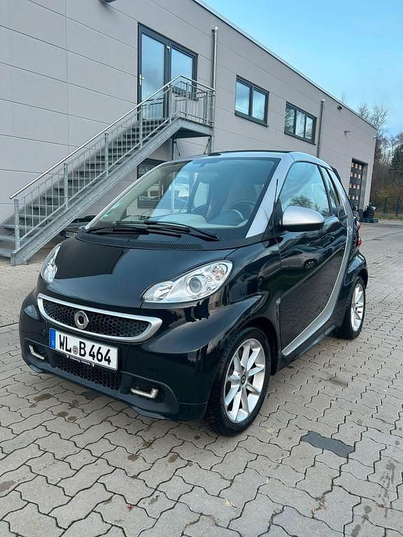 Schwarz Gebraucht 2012 Smart ForTwo Cabrio Passion Cabrio | 8.490 € (Fairer Preis) - Bild 1/4