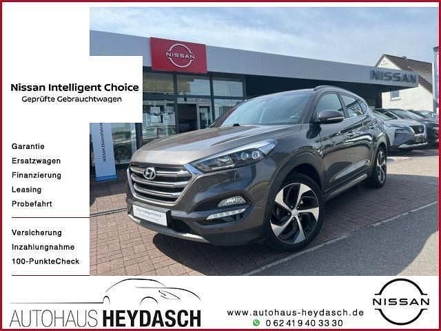 Braun Gebraucht 2017 Hyundai Tucson Premium SUV | 17.985 € (Fairer Preis) - Bild 1/4