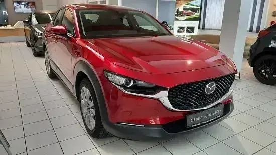 Gebraucht Mazda CX-30 122 PS (89 kW) 2023 Magmarot metallic SUV