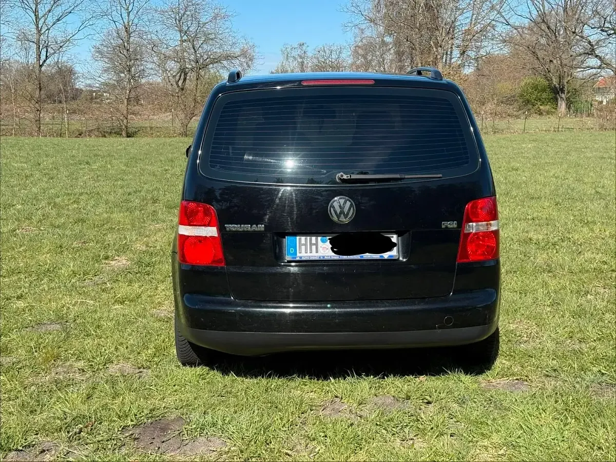 Używany VW Touran 120 KM (88 kW) 2006 Czarny Minivan