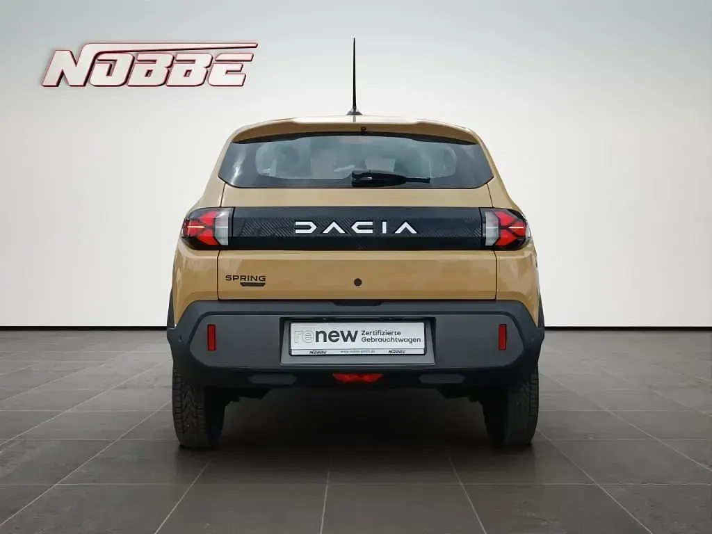Gebraucht Dacia Spring Expression 33 kW (45 PS) 2025 Beige Kleinwagen