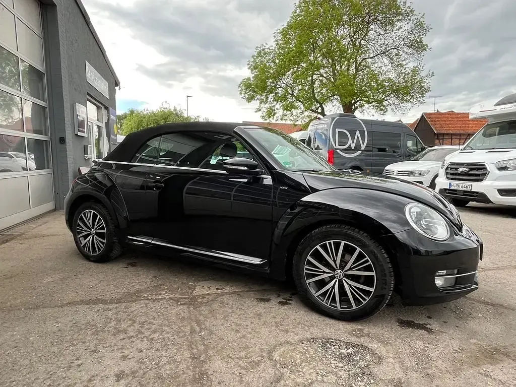 Używany VW Beetle Cabriolet Allstar 105 KM (77 kW) 2016 Czarny Kabriolet