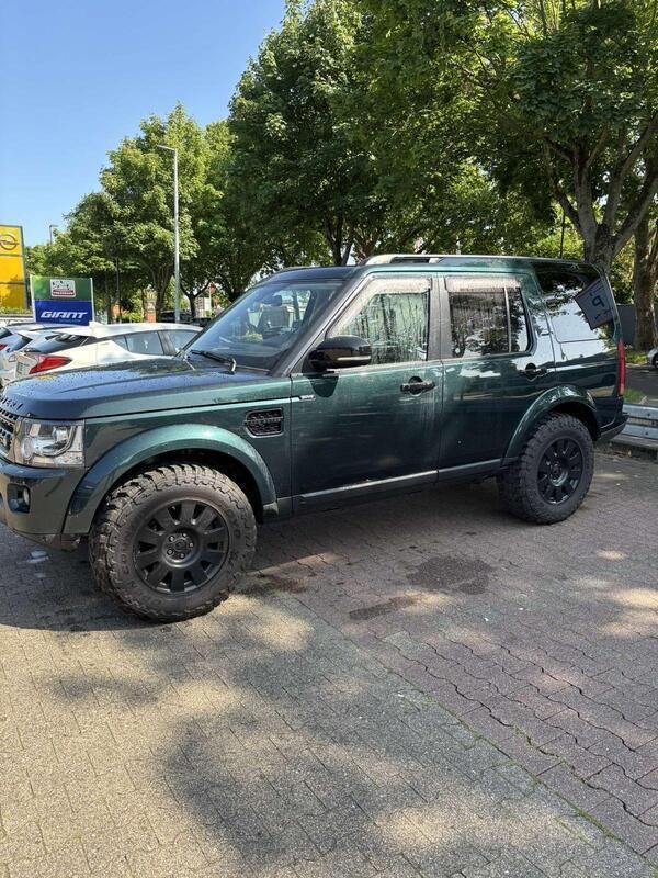 Grün Gebraucht 2015 Land Rover Discovery 4 Black Edition SUV | 21.500 € (Fairer Preis) - Bild 1/4