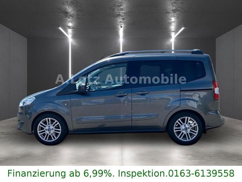 Grau Gebraucht 2016 Ford Tourneo Courier Titanium Van / Kleinbus | 8.290 € (Guter Preis) - Bild 1/4