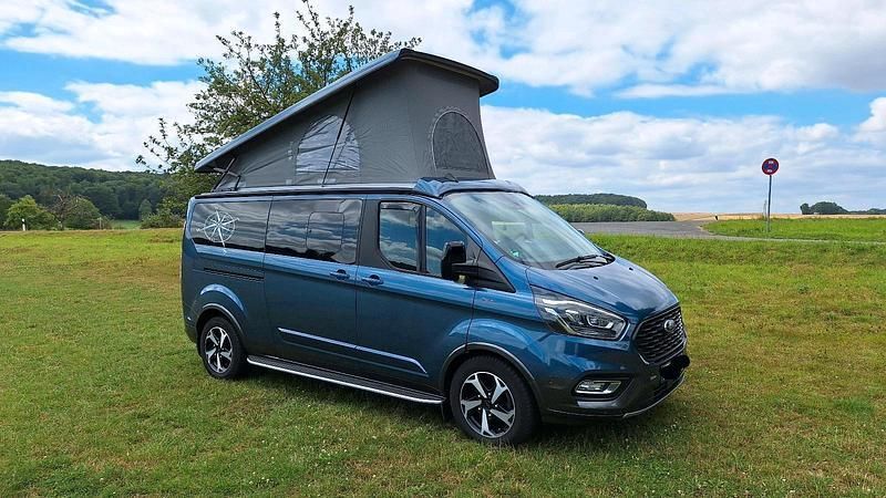 Blau Gebraucht 2021 Ford Tourneo Custom Active Van / Kleinbus | 49.900 € - Bild 1/4