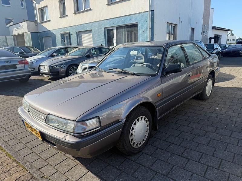Gebraucht Mazda 626 110 PS (80 kW) 1990 Braun Limousine
