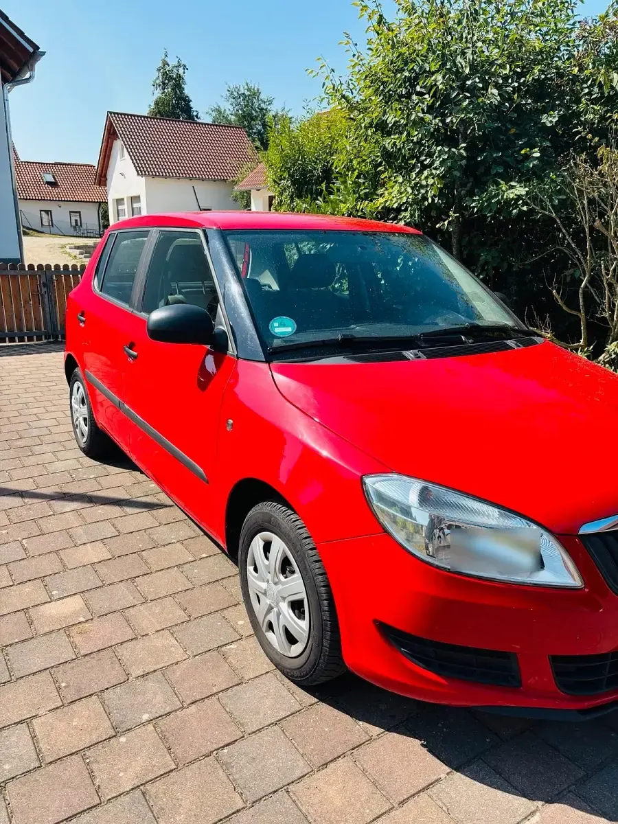 Gebraucht Skoda Fabia 60 PS (44 kW) 2012 Rot Kleinwagen