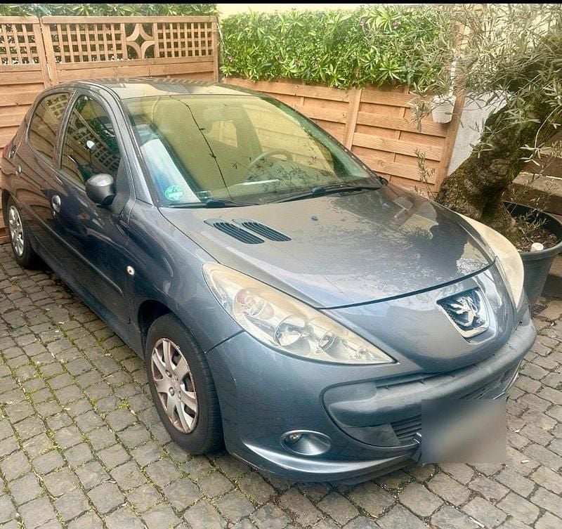 Gebraucht Peugeot 206+ 75 PS (55 kW) 2011 Beige Kleinwagen