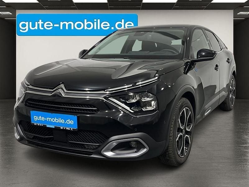 Schwarz Gebraucht 2024 Citroën e-C4 Shine Limousine | 19.490 € (Superpreis) - Bild 1/4