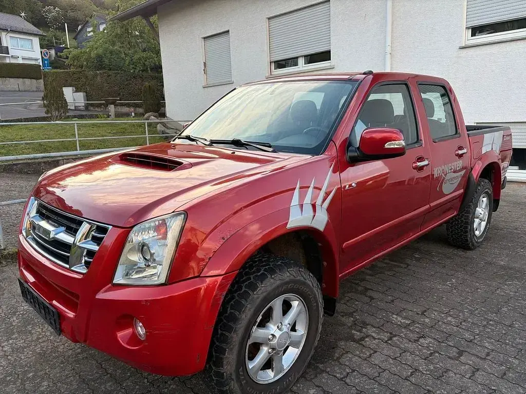 Second-hand Isuzu D-Max 163 CP (119 kW) 2007 Roșu SUV