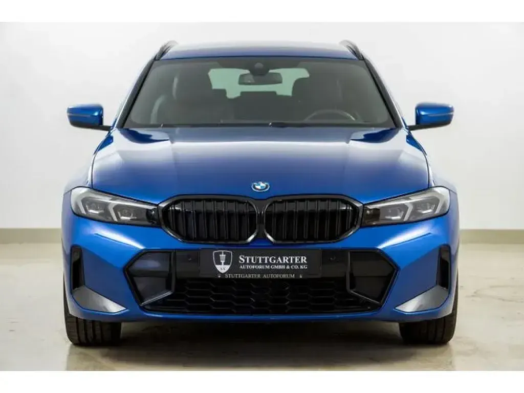 Gebraucht BMW 330e M Sport 292 PS (214 kW) 2022 Portimao blau m (metallic) Kombi