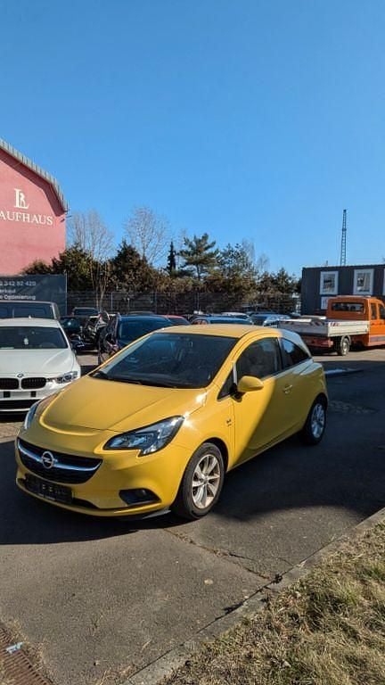 Second-hand Opel Corsa drive 90 CP (66 kW) 2015 Galben Hatchback