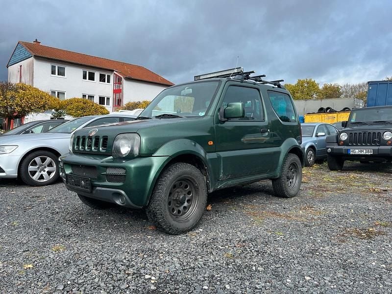 Grün Gebraucht 2009 Suzuki Jimny Comfort SUV | 7.900 € (Fairer Preis) - Bild 1/4
