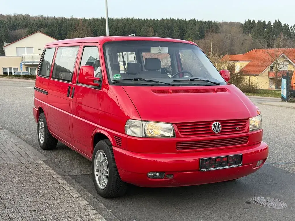 Second-hand VW Caravelle 204 CP (150 kW) 2000 Roșu Van