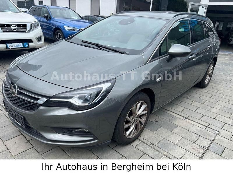 Grau Gebraucht 2017 Opel Astra Kombi | 7.950 € (Fairer Preis) - Bild 1/4