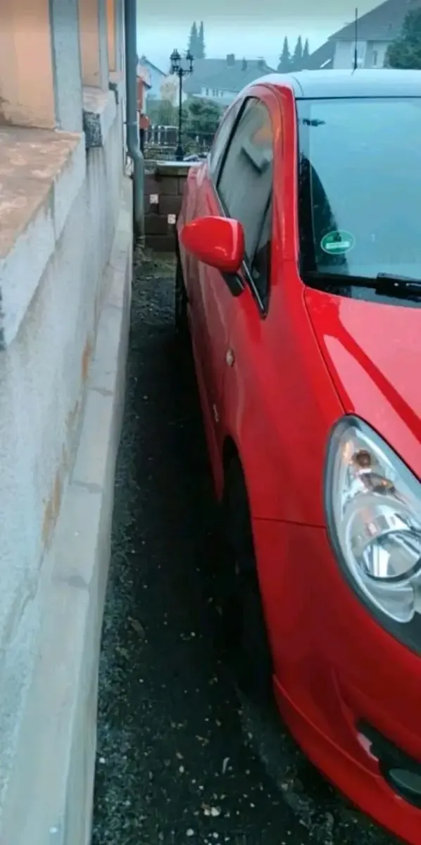 Używany Opel Corsa OPC 90 KM (66 kW) 2009 Czerwony Hatchback