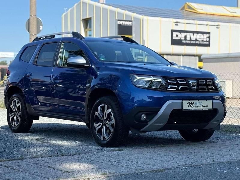 Iron blue Gebraucht 2022 Dacia Duster Prestige SUV | 20.840 € (Fairer Preis) - Bild 1/4