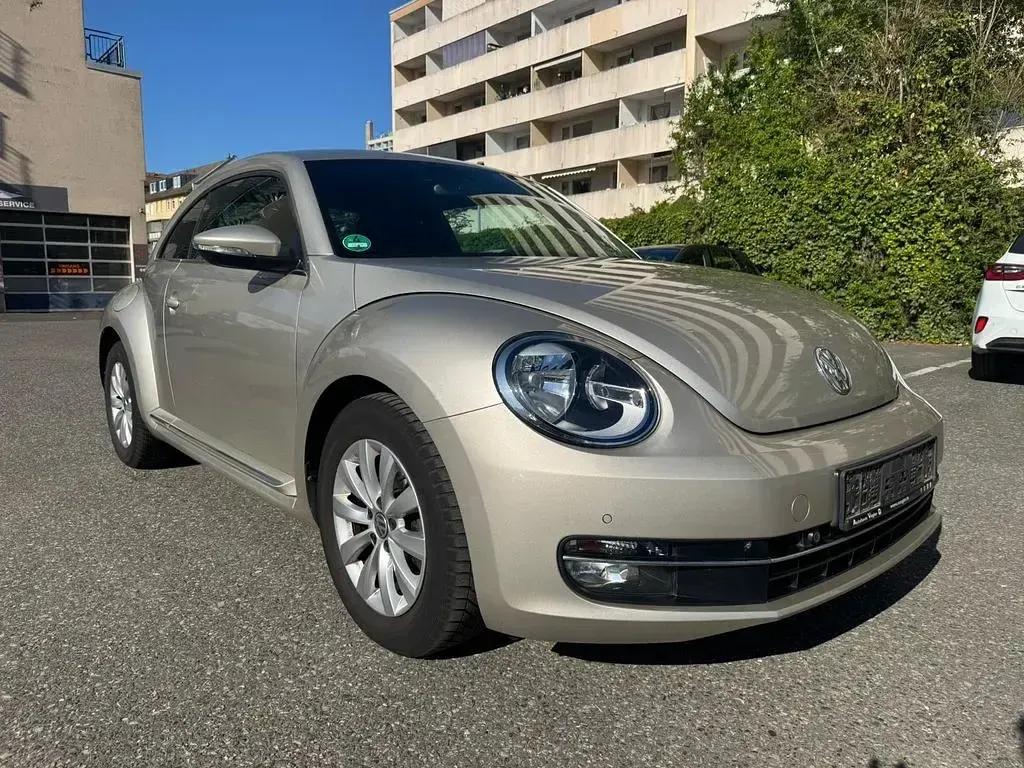 Gebraucht VW Beetle Design 110 PS (80 kW) 2015 Moon rock silver Kleinwagen
