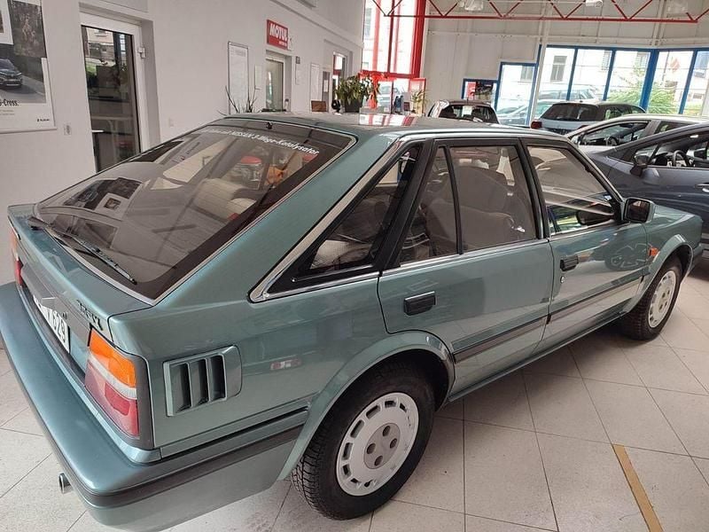 Gebraucht Nissan Bluebird 105 PS (77 kW) 1990 Grün Limousine