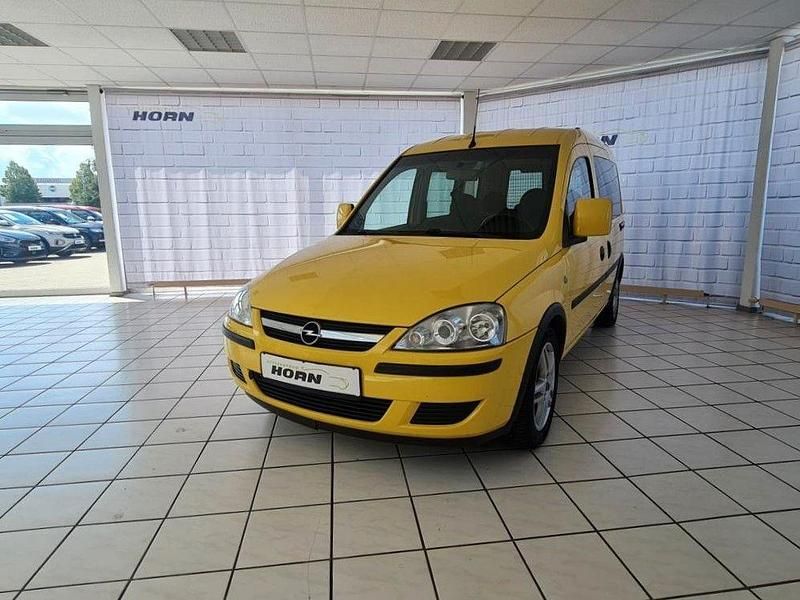 Gelb Gebraucht 2010 Opel Combo Edition Van / Kleinbus | 4.990 € - Bild 1/4