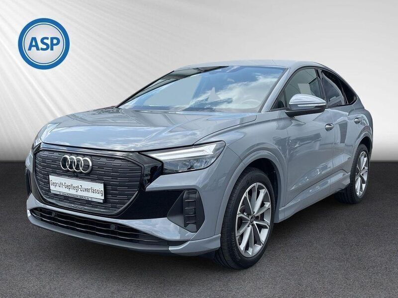 Grau kieselgrau Gebraucht 2022 Audi Q4 Sportback e-tron Advanced SUV | 32.690 € (Guter Preis) - Bild 1/4