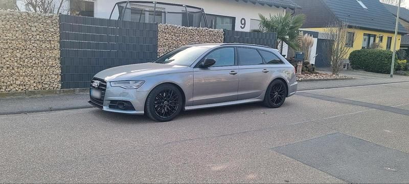 Second-hand Audi A6 Black Edition 320 CP (235 kW) 2018 Andere farben Break