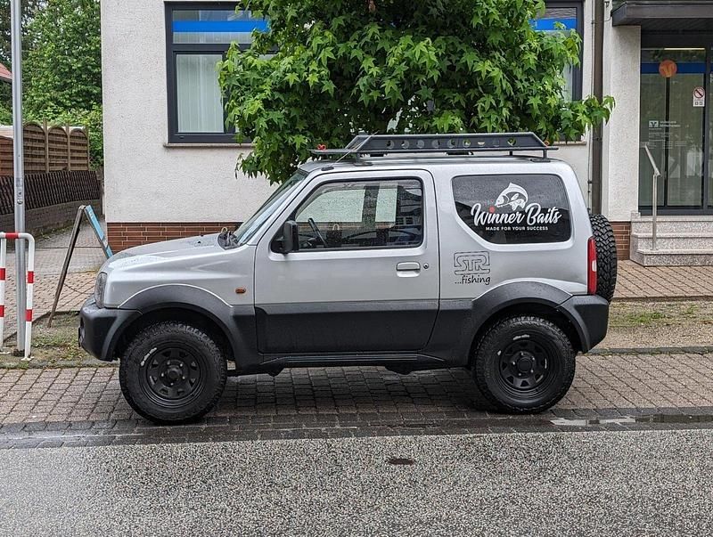Silber Gebraucht 2003 Suzuki Jimny SUV | 5.400 € - Bild 1/4