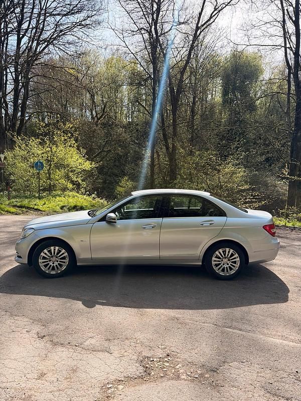 Second-hand Mercedes C180 Elegance 158 CP (116 kW) 2012 Argintiu Berlinǎ