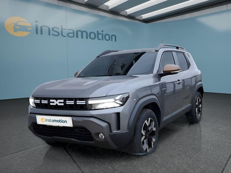 Grau Neu 2025 Dacia Duster SUV | 31.199 € (Teuer) - Bild 1/4
