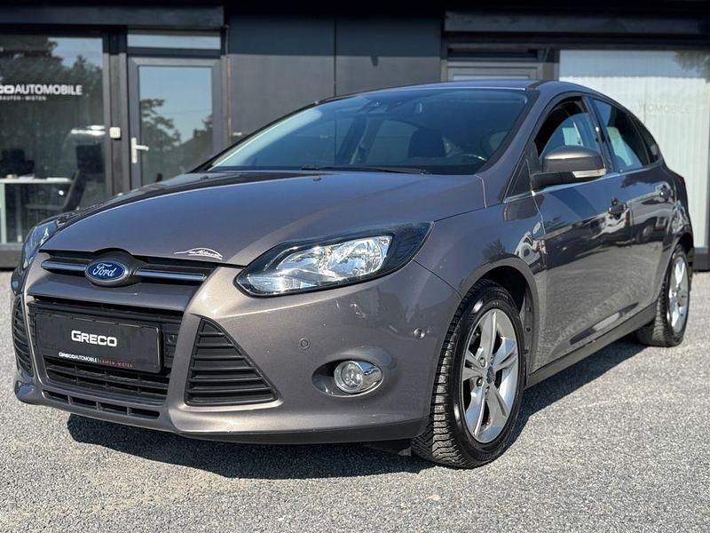 Braun Gebraucht 2012 Ford Focus Champions Edition Limousine | 6.490 € (Fairer Preis) - Bild 1/4