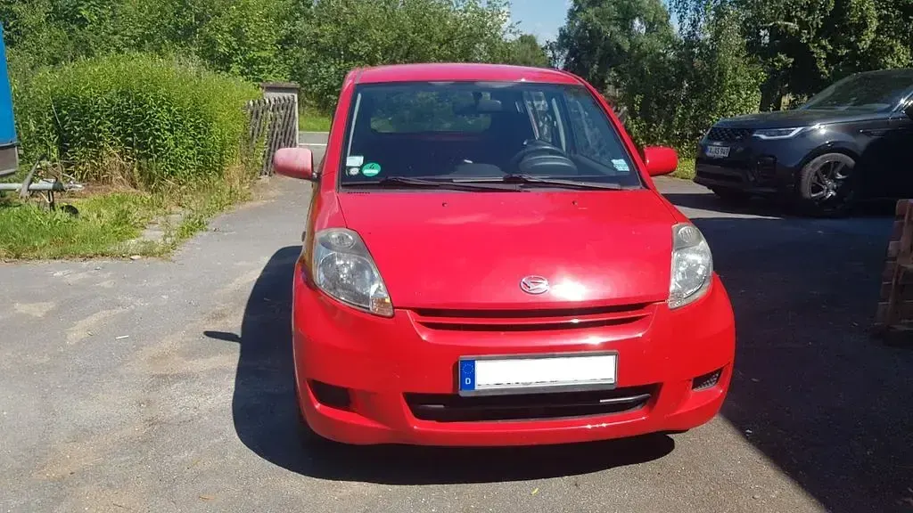 Gebraucht Daihatsu Sirion 69 PS (50 kW) 2009 Rot Kleinwagen