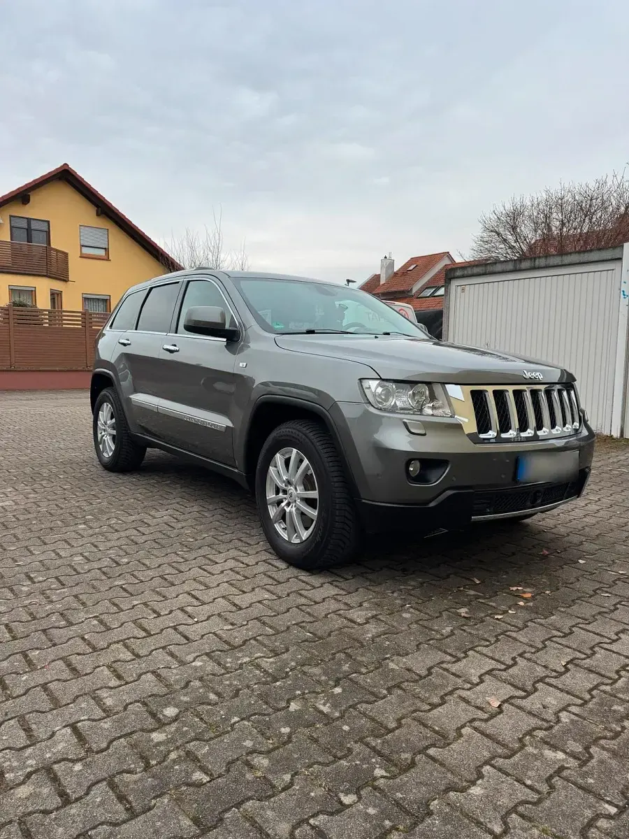 Gebraucht Jeep Grand Cherokee Overland 241 PS (177 kW) 2013 Silber SUV