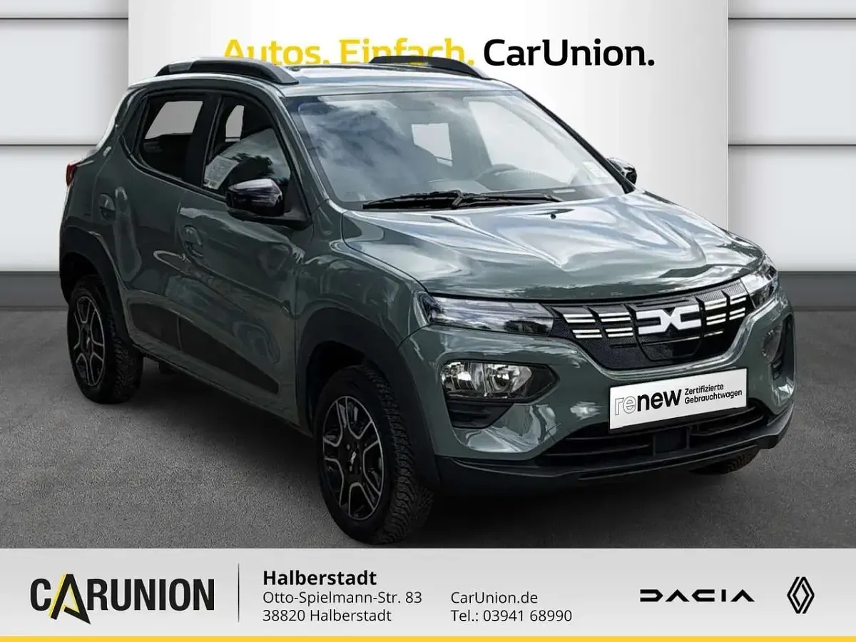 Gebraucht Dacia Spring Essentiel 33 kW (45 PS) 2023 Olivgrau Kleinwagen